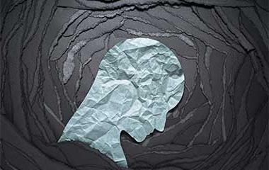 Silhouette of depressed person head.